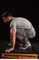  Larry Steel  1 boots dressed grey camo trousers grey t shirt kneeling shoes whole body 0003.jpg